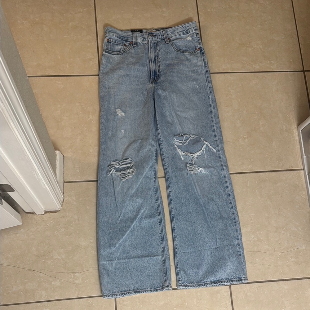 Women's Light Blue Distressed Jeans